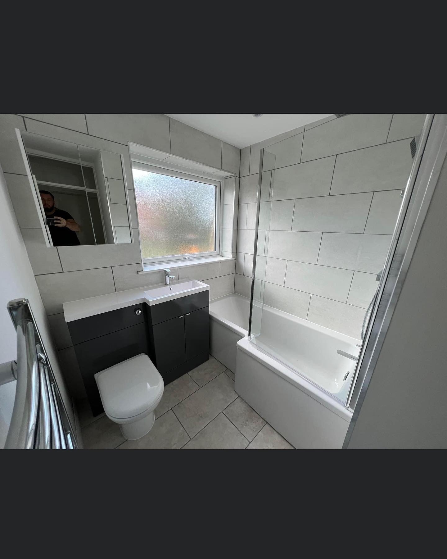 Modern bathroom suite installation tiling